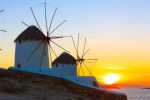 Mykonos Island, showing wind mils with a sunset. Mykonos Island, showing wind mils with a sunset.