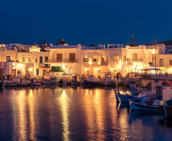 Naoussa village in Paros Island, in the Cyclades. Naoussa village in Paros Island, in the Cyclades, at night.