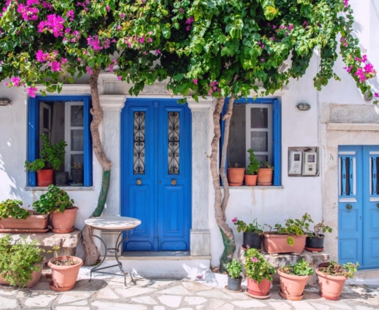 Blue door in house in Tinos. Blue door in house in Tinos.