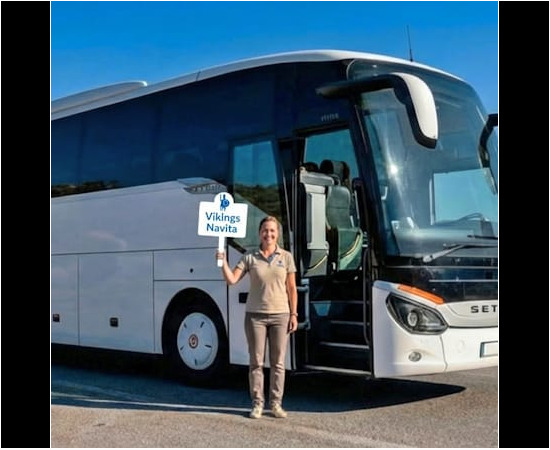 AI Tour guide in front of a 50 seater